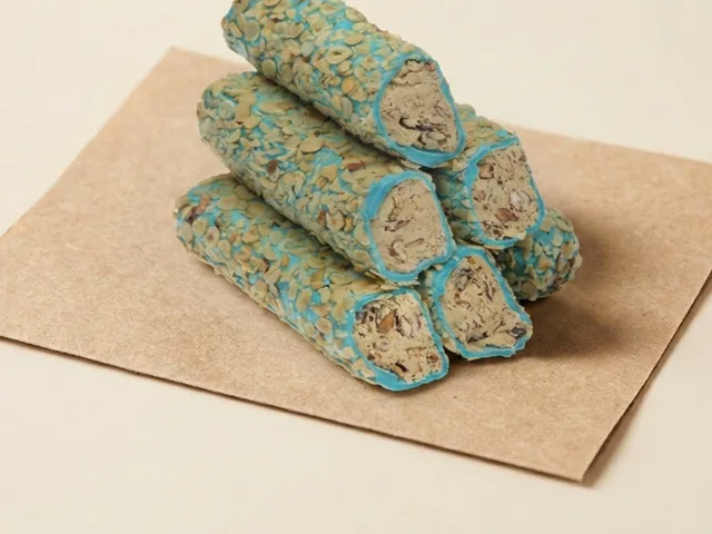 Slivered-hazelnut coated Italian caramel cream roll